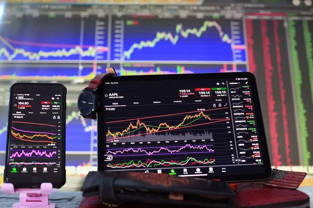 NVIDIA on NASDAQ - stock on laptop mobile watch
